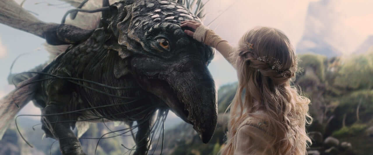 Aurora, with long braided fair hair, gently strokes the head of a large dark winged creature of the Moors